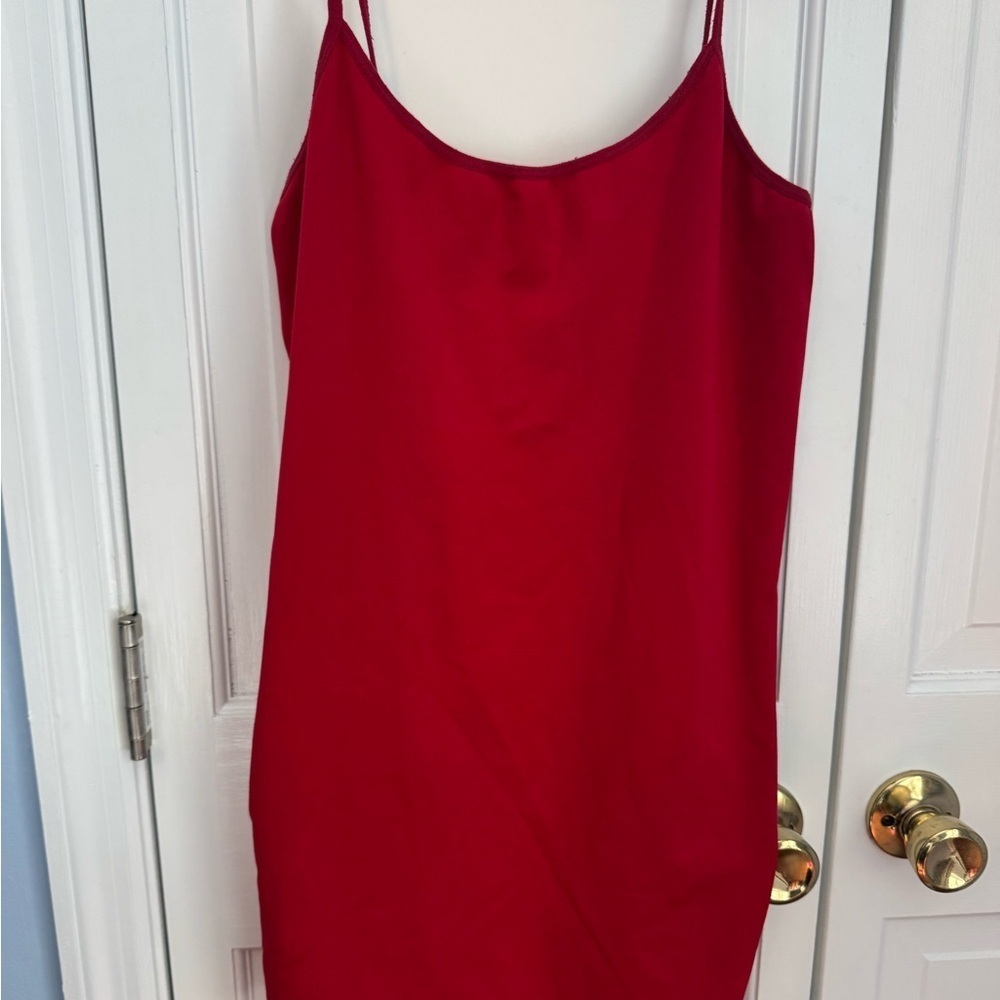 Simple Red tank top, quality material not flimsy. Perfect for layering or alone!